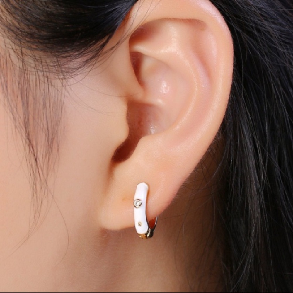 White enamel gold hoop earrings